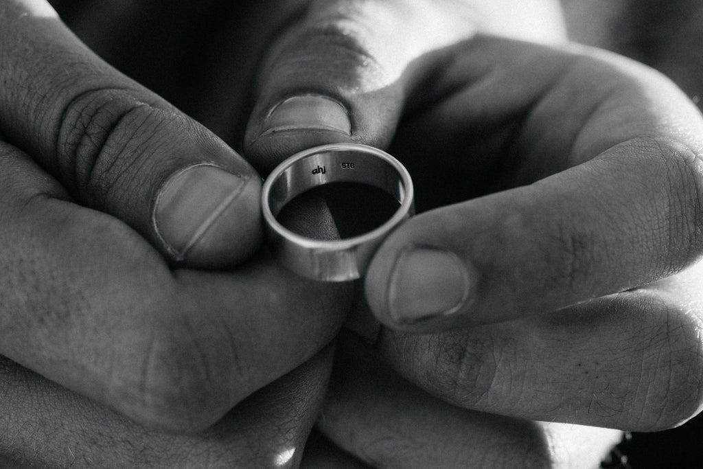 Online consultation: hands holding metal ring