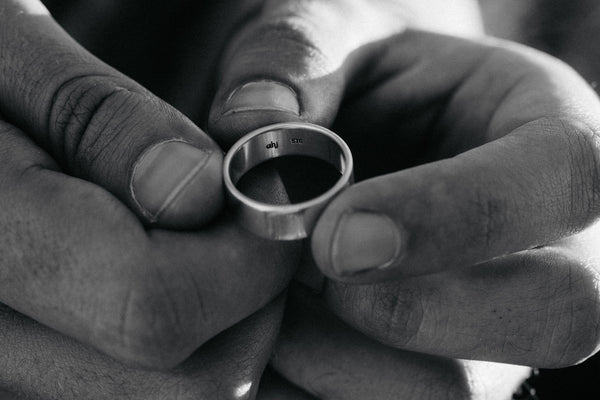 Online consultation: hands holding metal ring